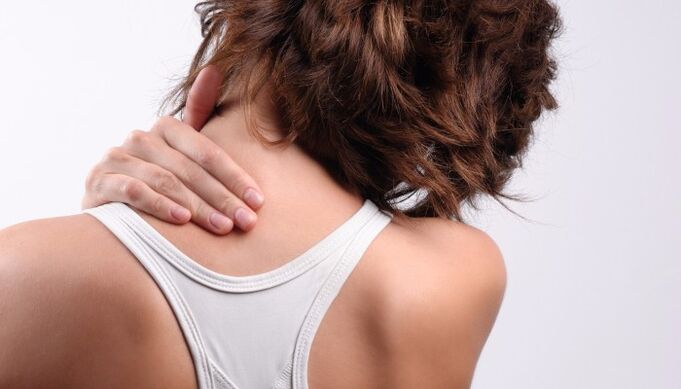 the girl has neck pain